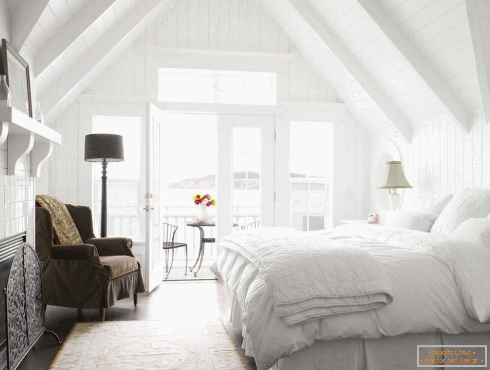 The idea of ​​creating a small bedroom in the attic floor