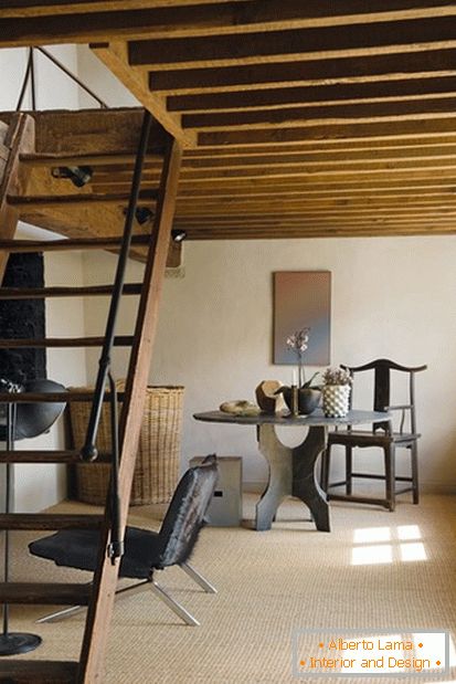A simple wooden staircase to the attic