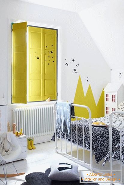 Bright yellow colors in the white children's room