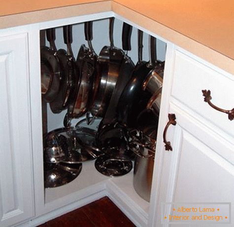 Hooks for dishes in a corner cabinet