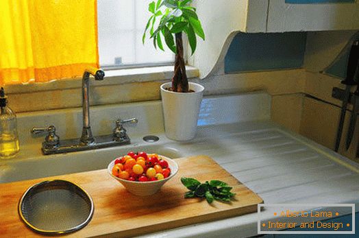 Cutting board on the kitchen sink
