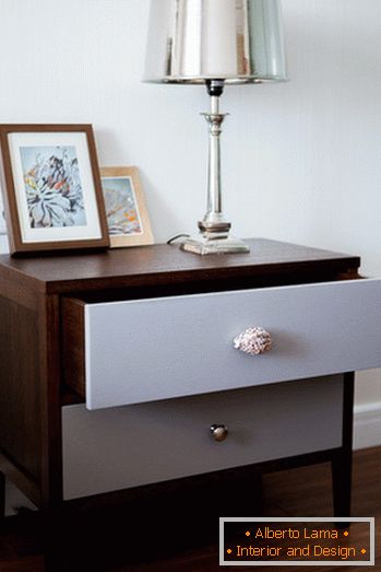 A bedside table in the bedroom of a small apartment in Moscow