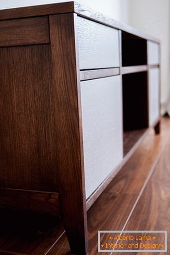 A bedside table in the bedroom of a small apartment in Moscow