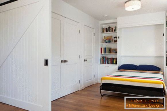 Folding bed in white bedroom