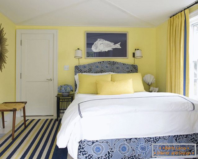 Charming design of a small bedroom in blue and yellow colors