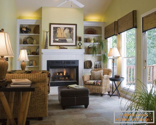 Wicker furniture in the living room with fireplace