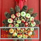 Cones and apples on a wreath