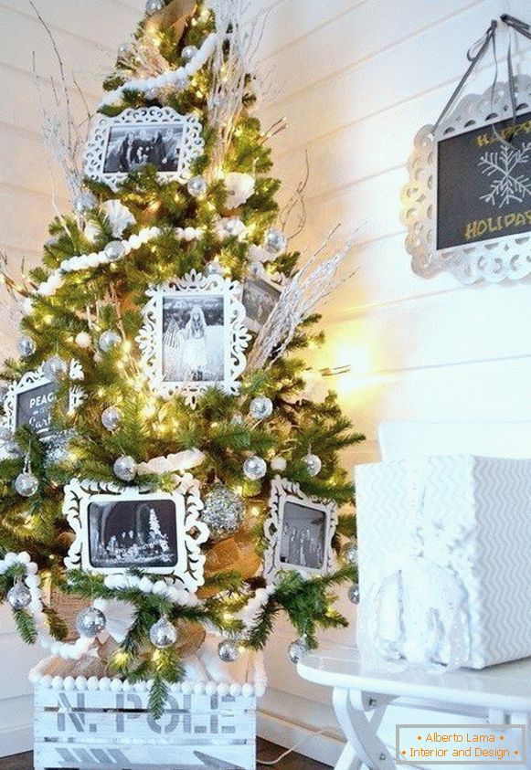 Decoration of a Christmas tree with photo frames