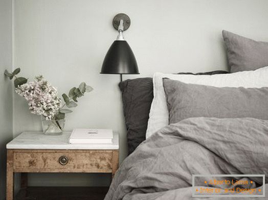 Cozy bedroom interior in gray tones