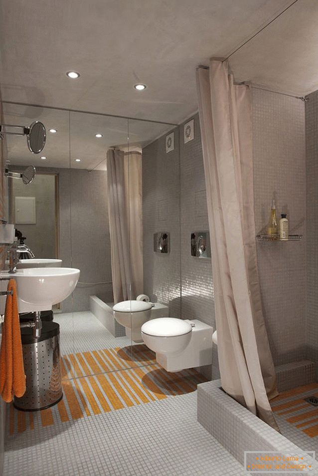 Interior of a small bathroom combined with a toilet