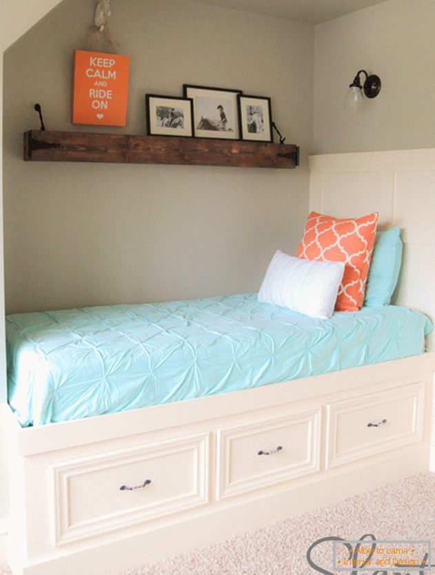 A beautiful combination of white shelves with a blue blanket