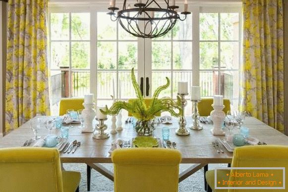 Yellow curtains in the interior of the dining room kitchen