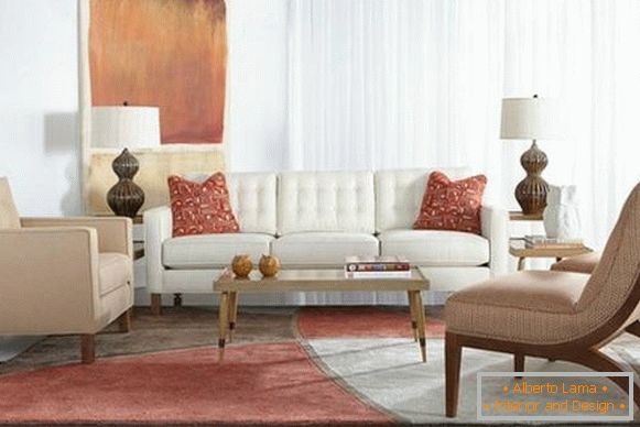 White sofa and beige armchairs in the hall