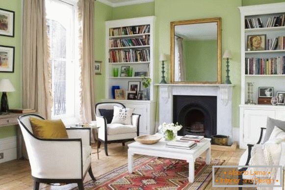 Green interior of the living room with white furniture