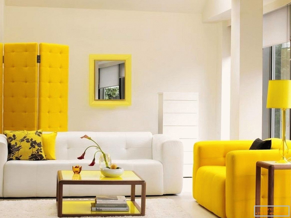 The combination of white and yellow furniture in the interior