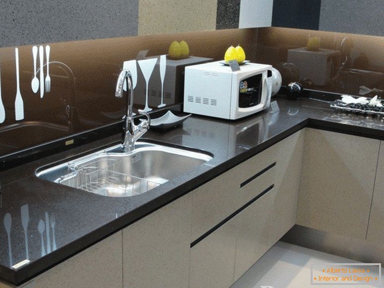 White cabinets and granite countertop in the kitchen