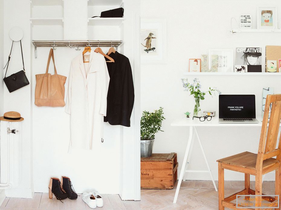 Work area in the hallway of a small one-room apartment