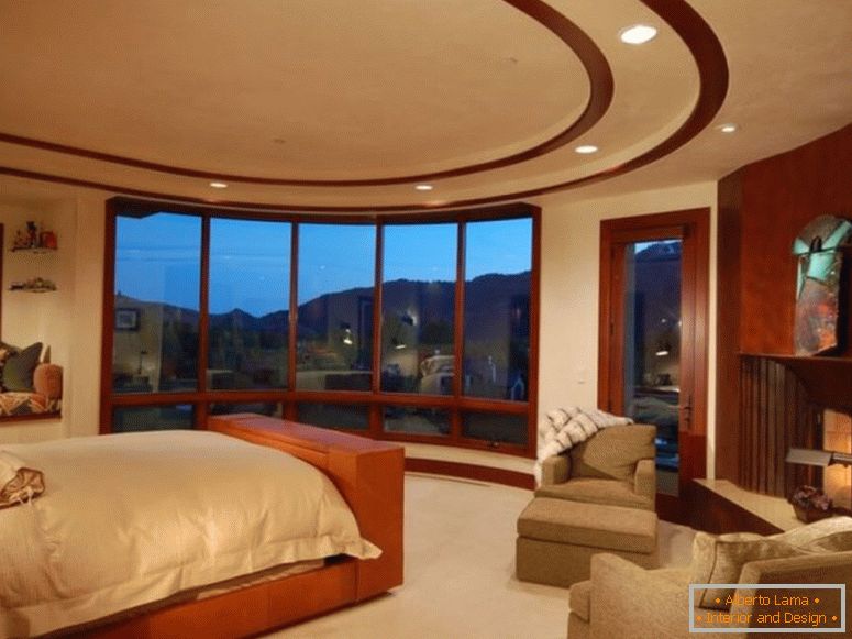 large-master-bedroom-with-built-in-day-bed-bay-window-balcony