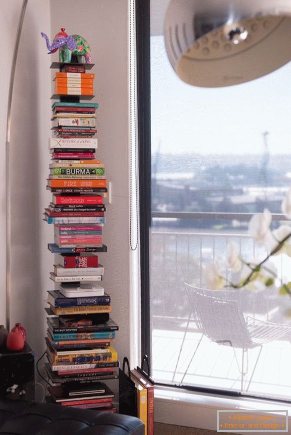 A shelf for books in the corner