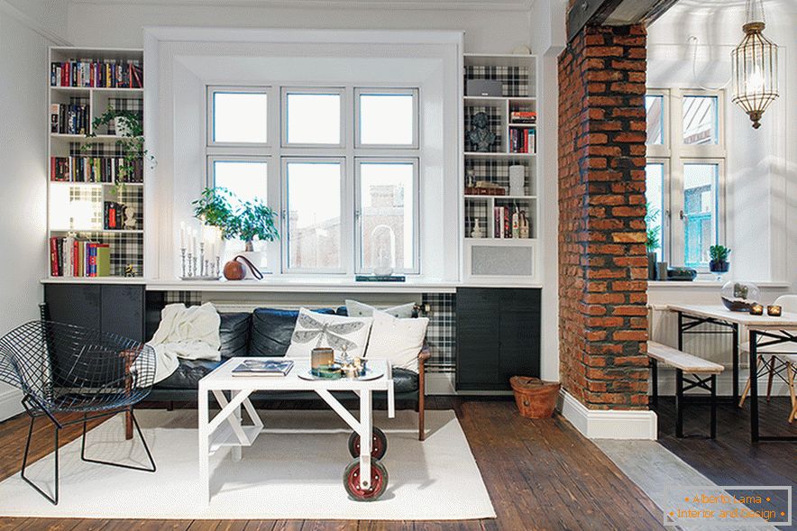 Designer armchair in the interior of the living room