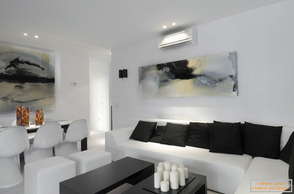 White room with black decor elements