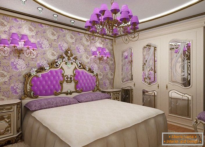 A wallpaper with delicate colors in the tone of the bed and plafonds on the chandelier and lamps.