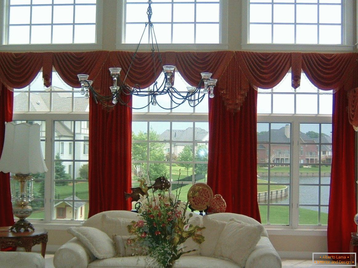 Red curtains in the white living room