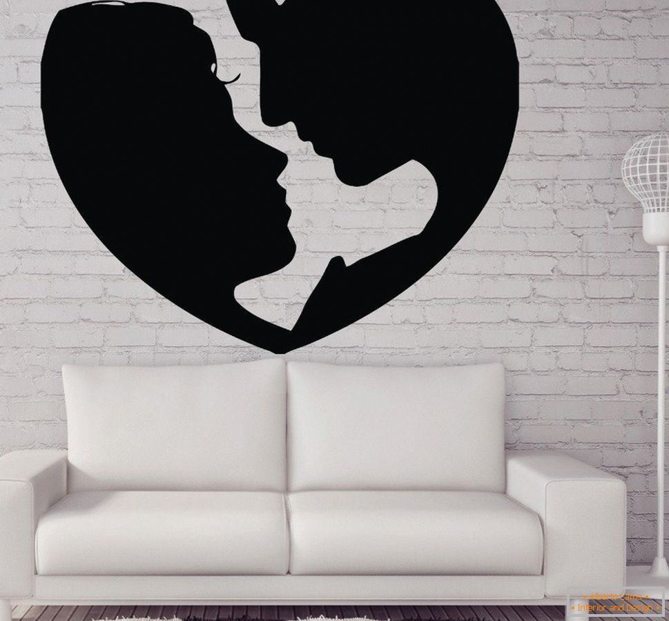 Decor on the wall with the profile of the couple in love