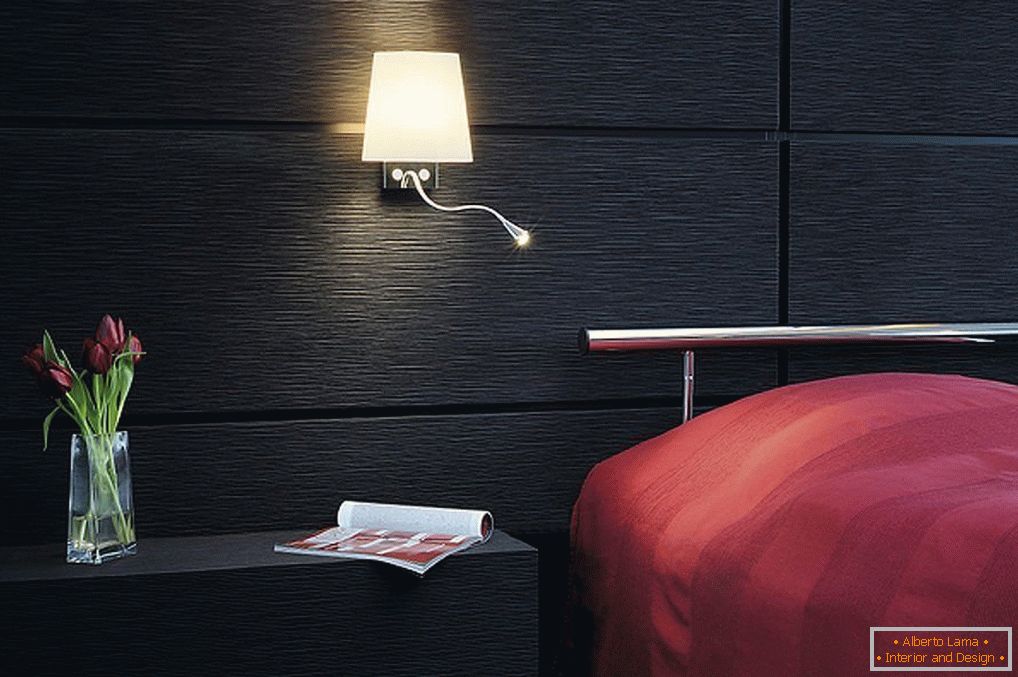 Bedroom with black walls and a lamp