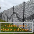 The fence of gabions on the site