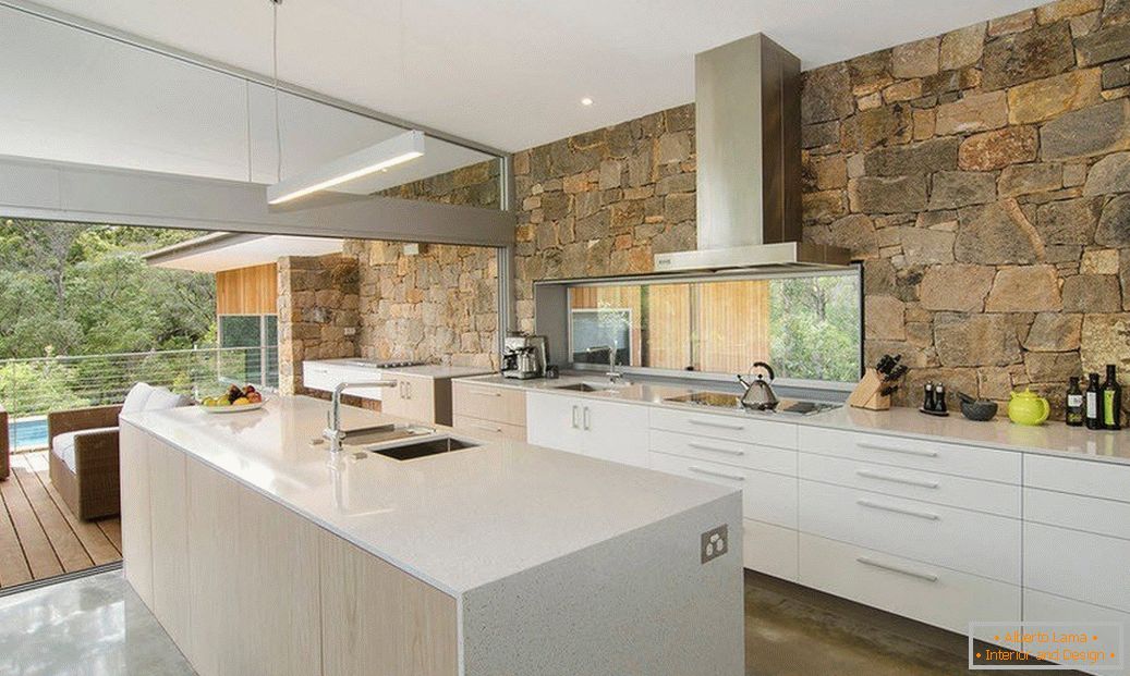 Stone in the interior of the kitchen в стиле модерн