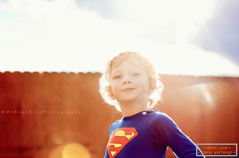Boy in a superman costume
