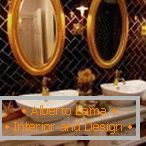 Mirrors in the bathroom with gold leaf