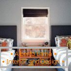 Bright bedside table between the beds