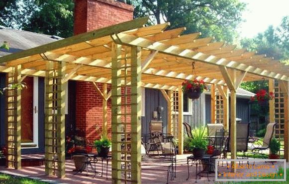 Canopy gazebo in the design of the courtyard of a private house