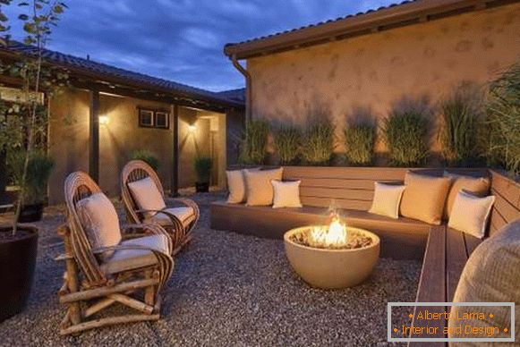 Landscape design of a private house - photo of a recreation area by the fire