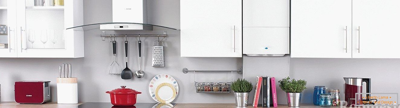 White kitchen with a boiler on the wall