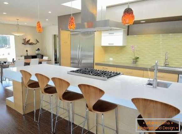 Design of modern kitchens in a private house - photo from the dining room