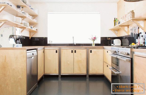 красивый corner kitchen design in a private houseфото