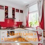 White kitchen with red apron