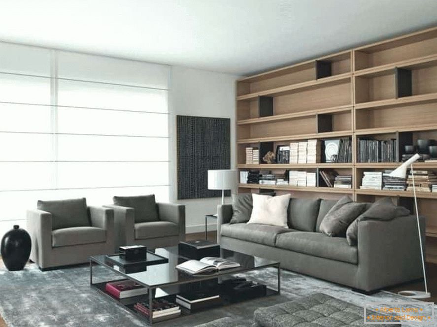 Living room of a square shape with a large window and bookshelves all over the wall