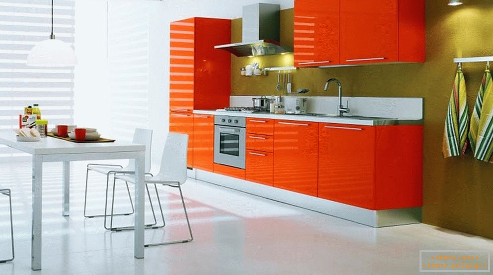 White floor and orange furniture in the kitchen