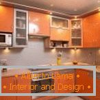 LED backlight in orange kitchen