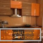 Wooden orange furniture in the kitchen