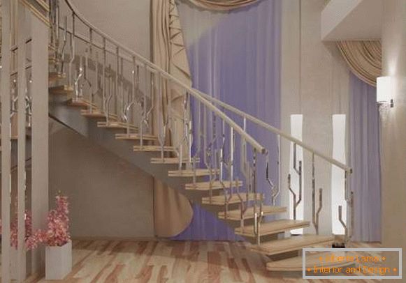 The idea of ​​a hall design with a staircase in the interior of a private house