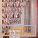 Curtain with flowers on the kitchen window