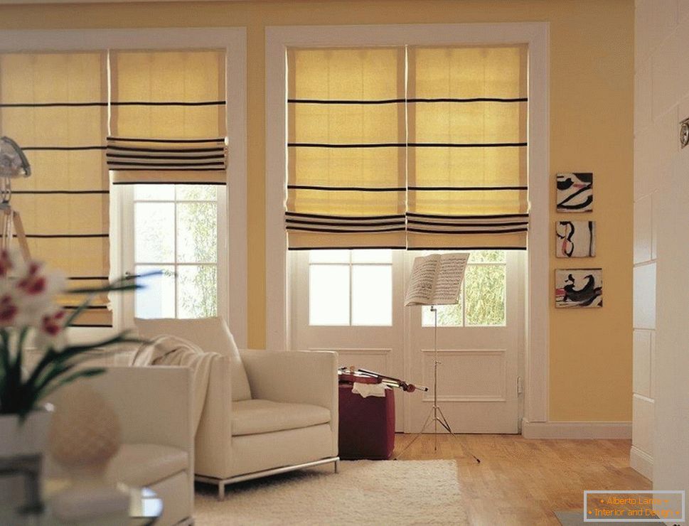Yellow curtains with black stripes on the windows