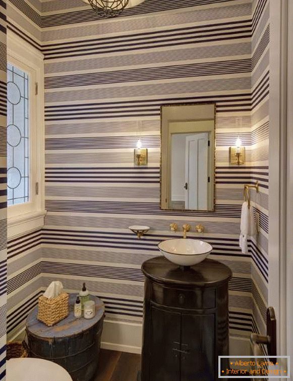 Modern design of the toilet with striped wallpaper