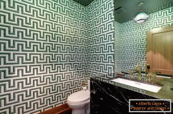 Luxurious toilet interior with green wallpaper and marble