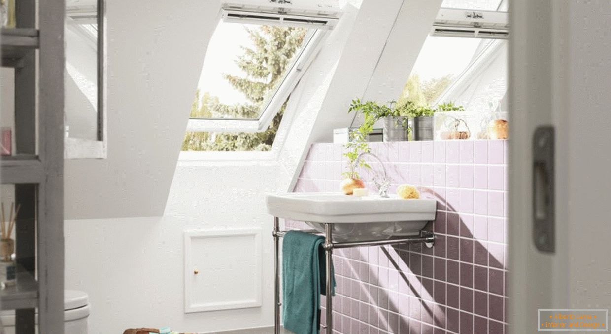 Bathroom with a window in the attic